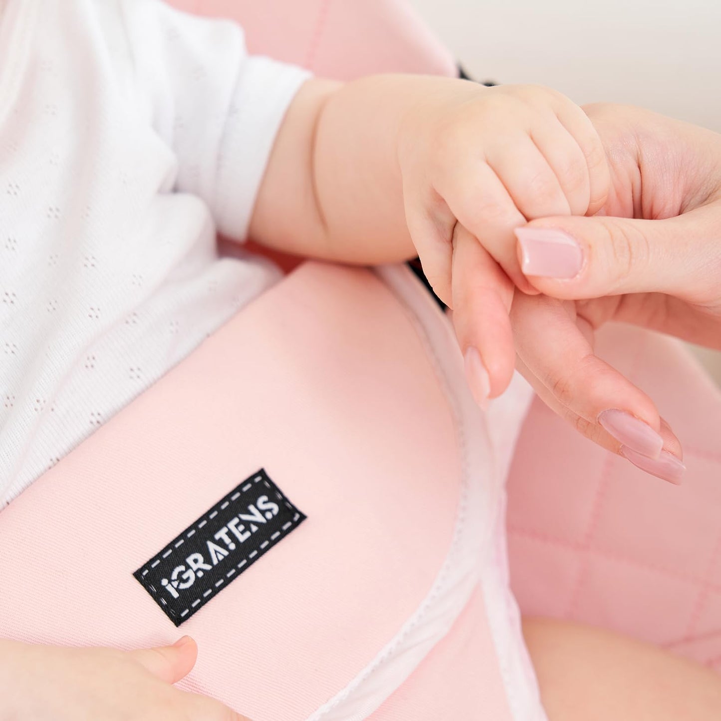 Close up of soft cotton material on pink bouncer seat