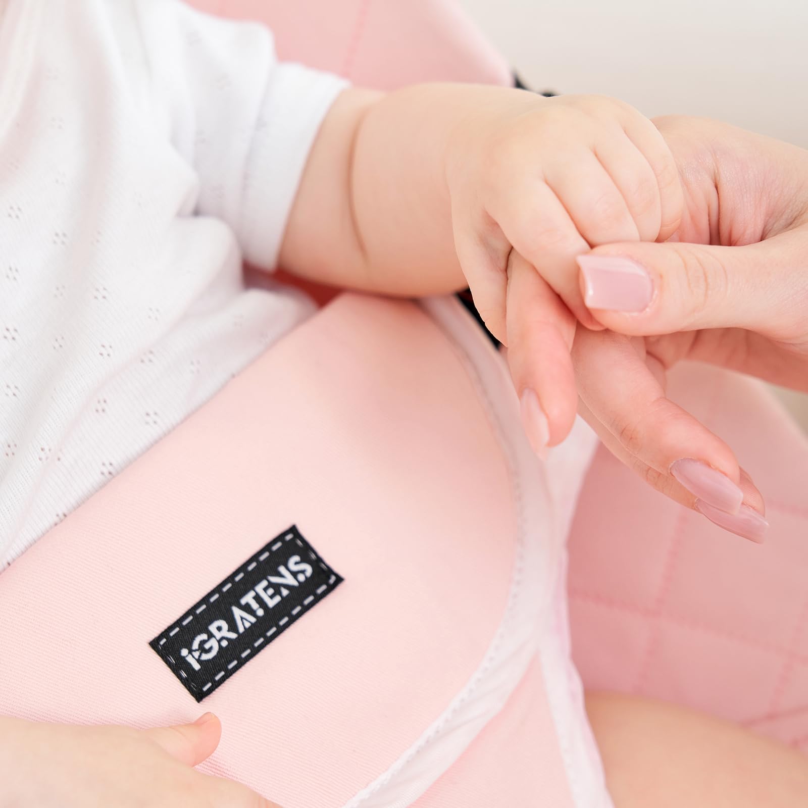 Close up of soft cotton material on pink bouncer seat