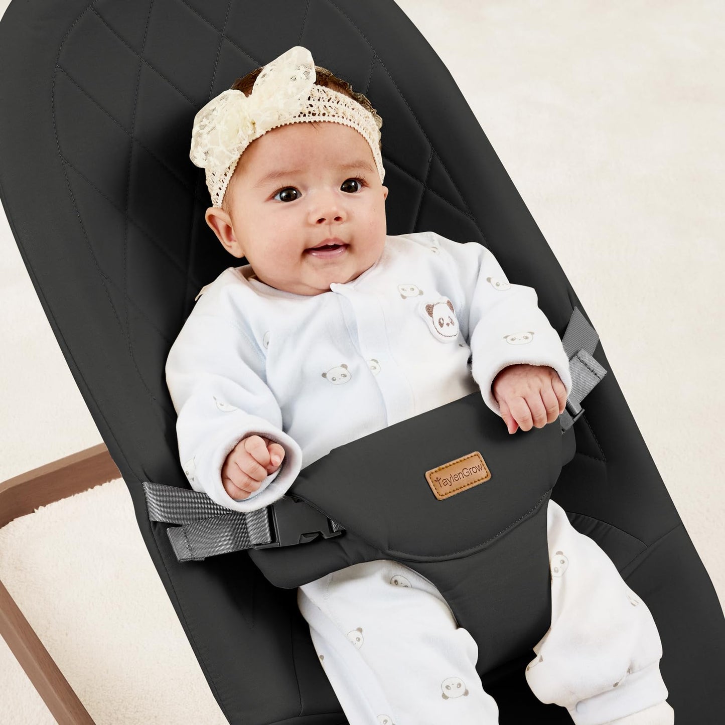 Side profile of Taylengrow baby bouncer in folded position
