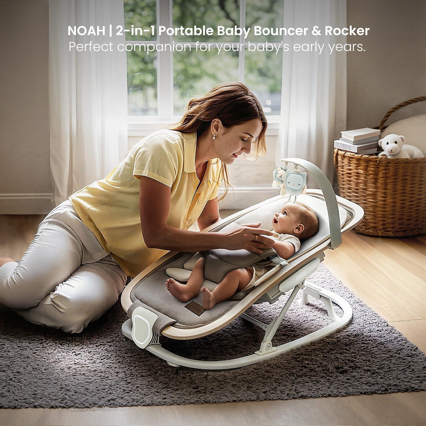 Infant seated in Ikomzy portable rocker chair