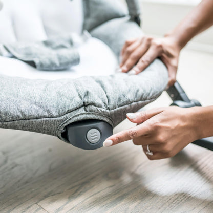 Baby Delight Aura Deluxe showing the control unit for vibration and sound