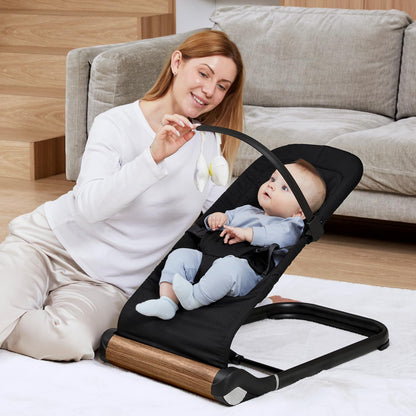 Ergonomic baby bouncer chair folded flat for travel
