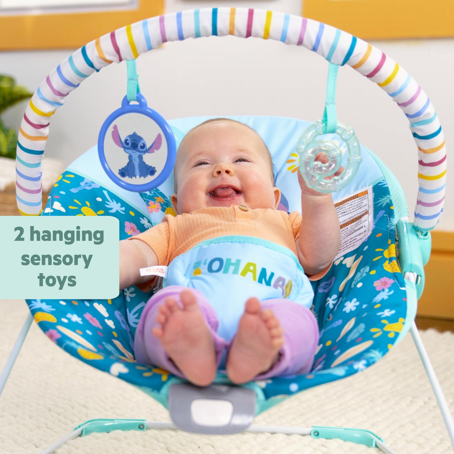 Close up of Stitch themed sensory toys and baby safe mirror