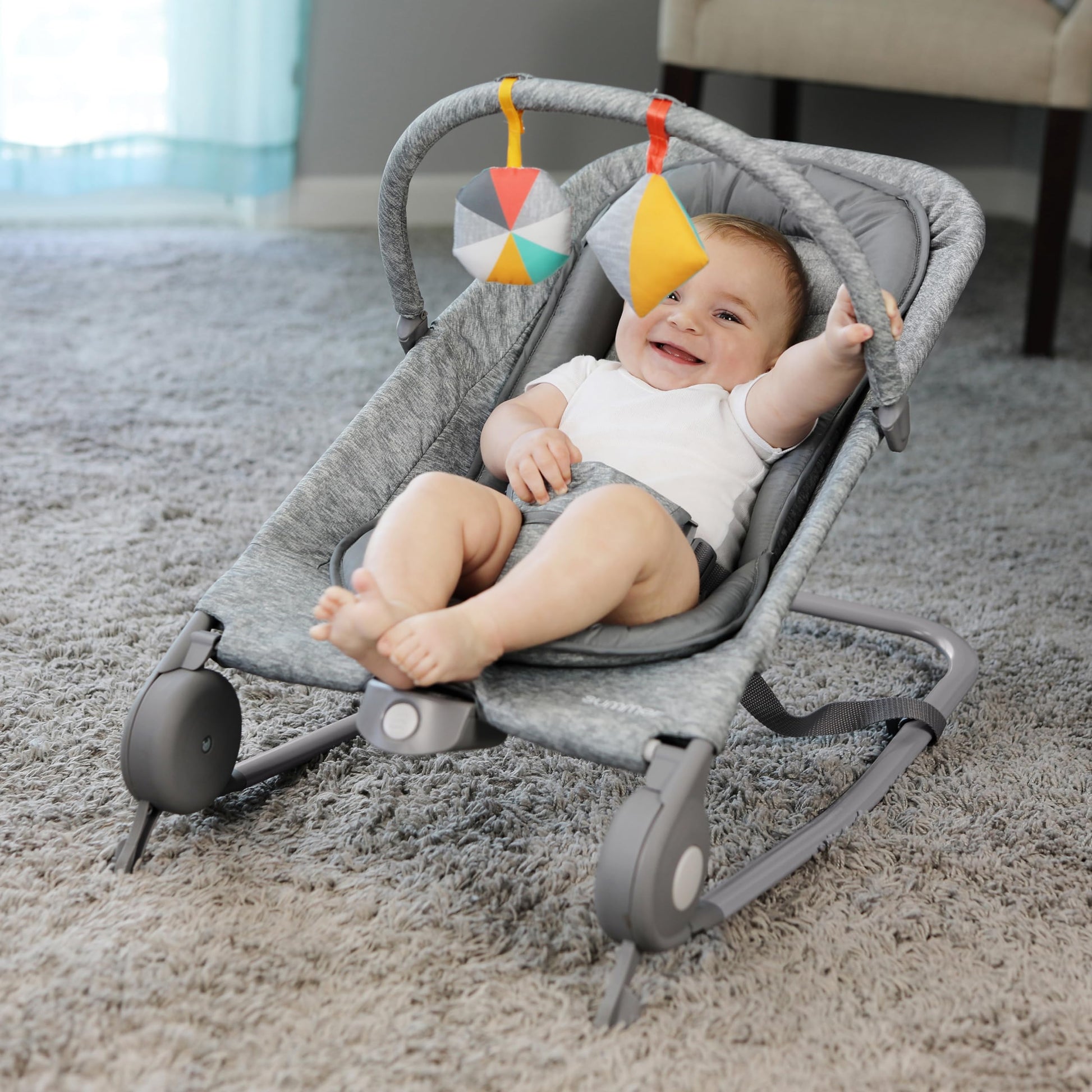 Side profile of Summer Infant rocker and bouncer showing folding mechanism