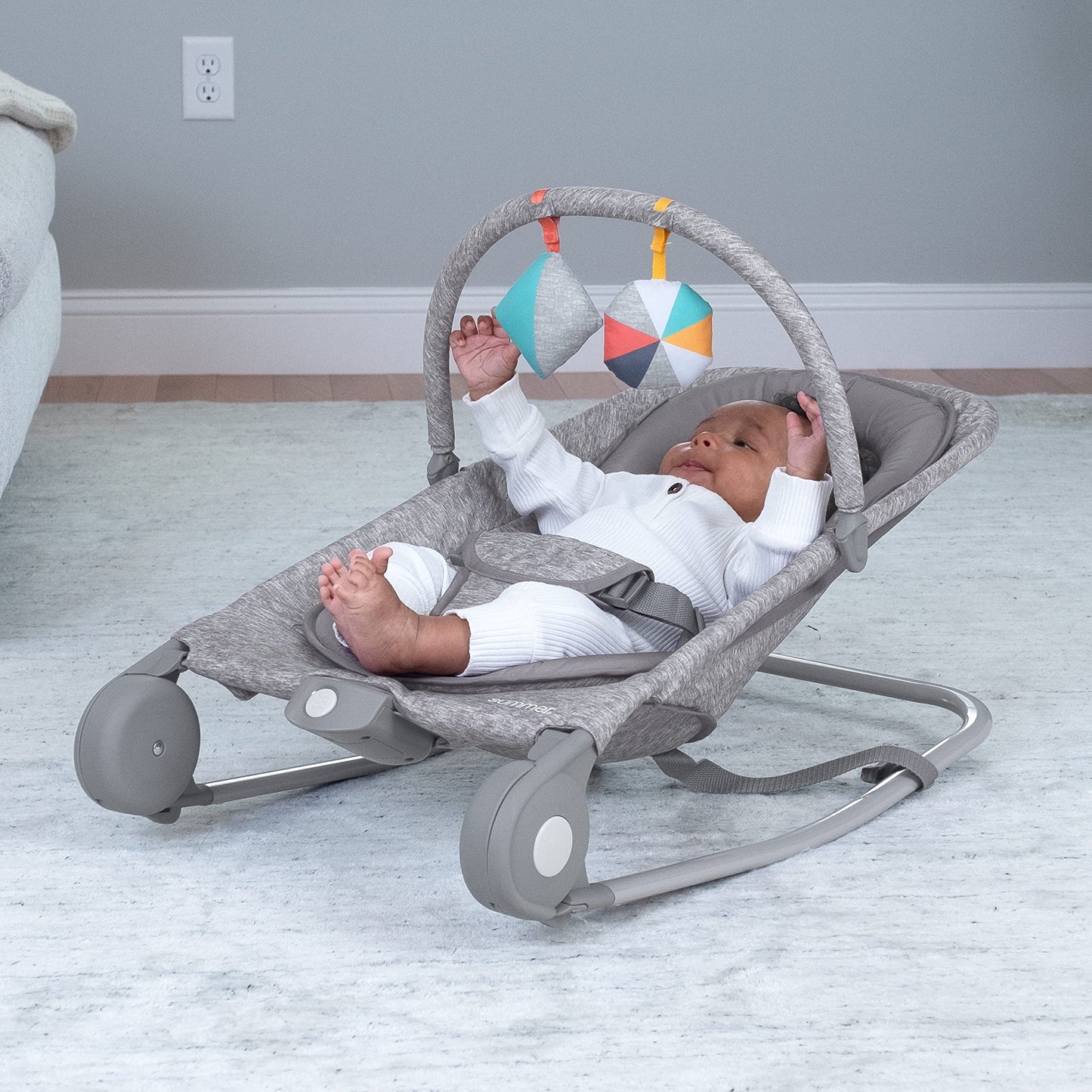Summer Infant bouncer folded flat for travel and storage