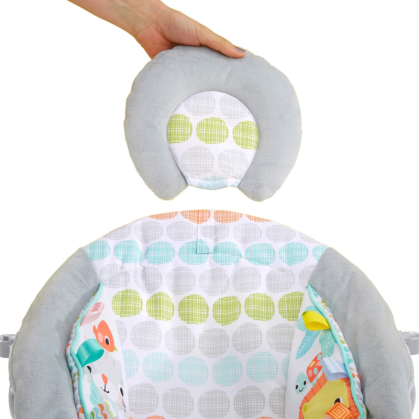 Close up of Taggies sensory tags on baby bouncer