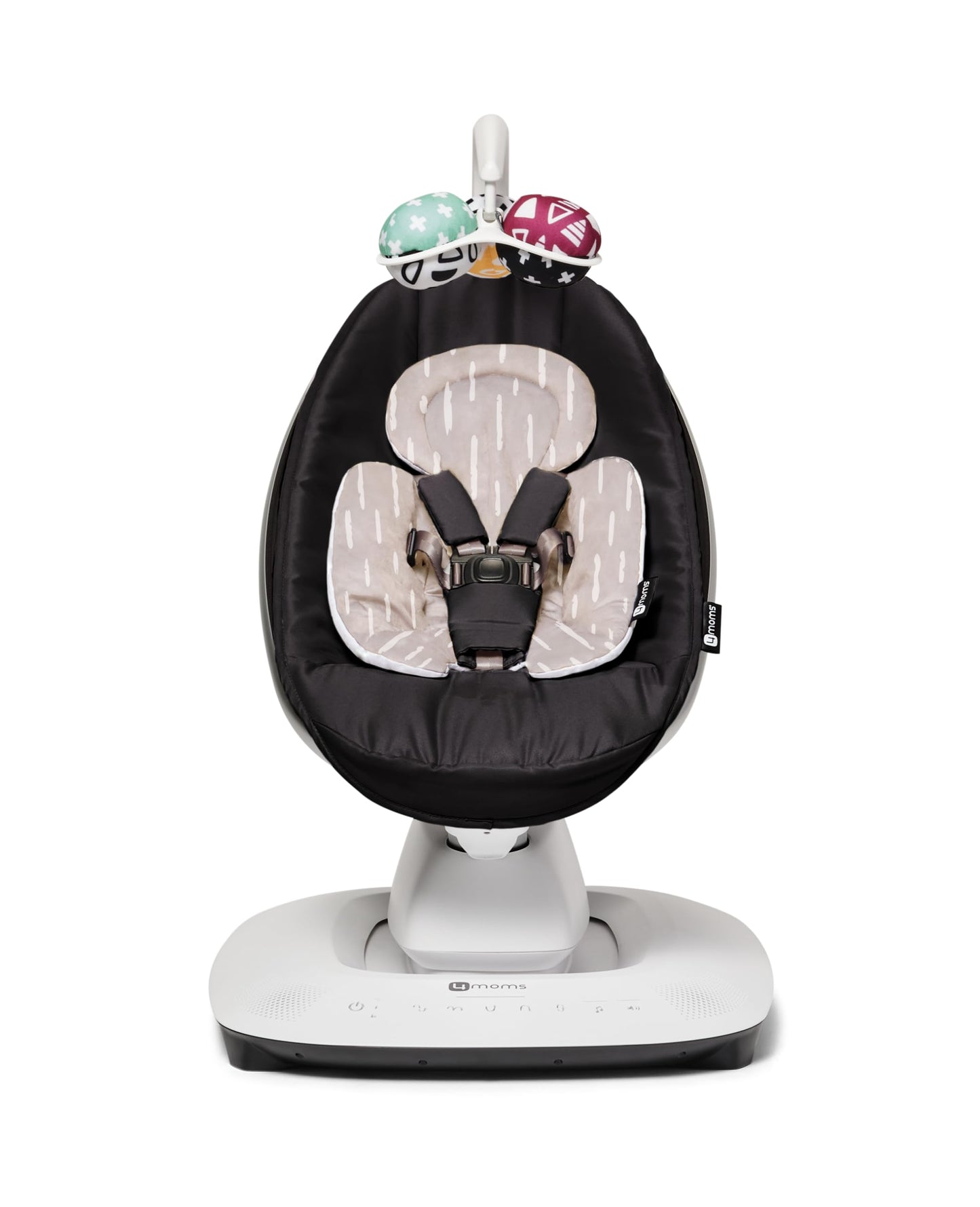 4moms newborn insert installed in a baby swing for support