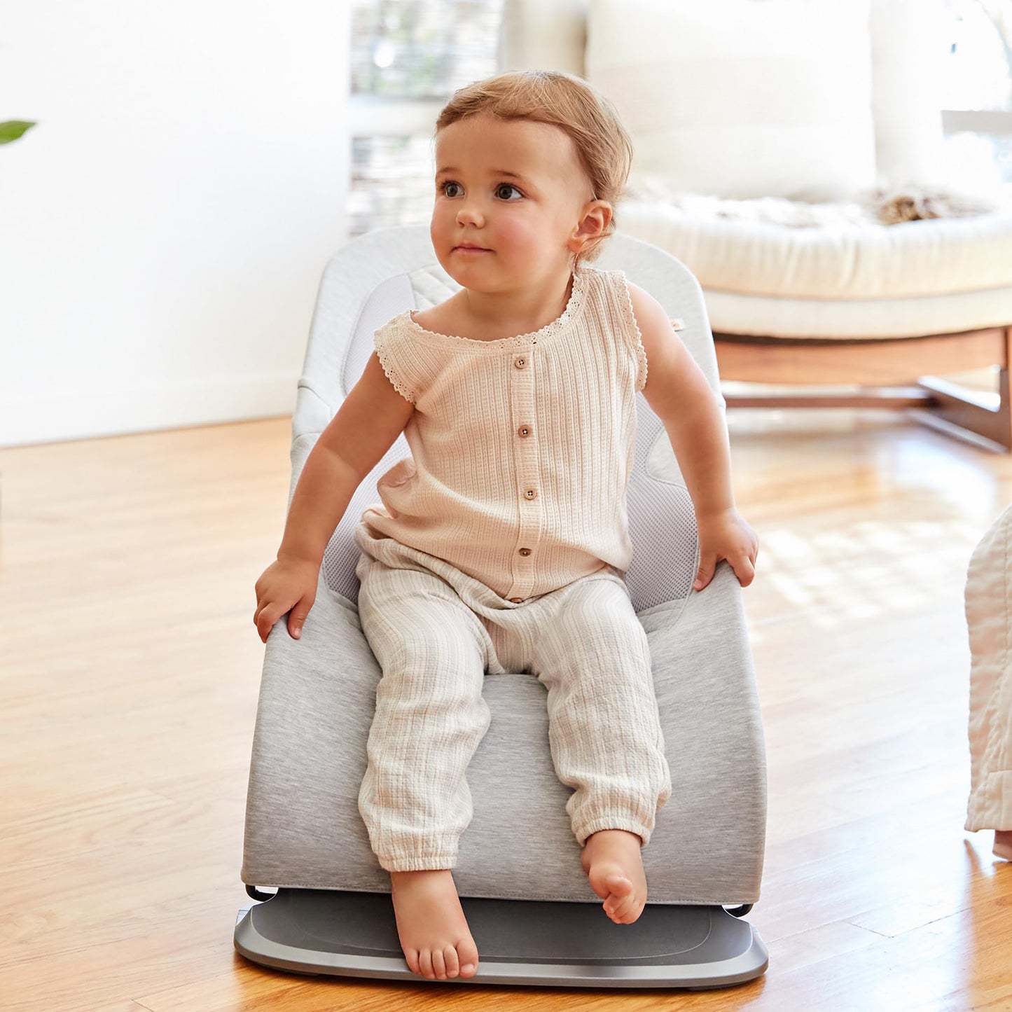 Ergobaby Evolve bouncer step pedal adjustment mechanism