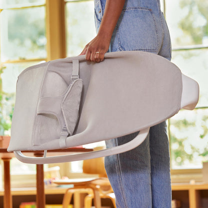 Munchkin foldable baby bouncer and rocker for travel