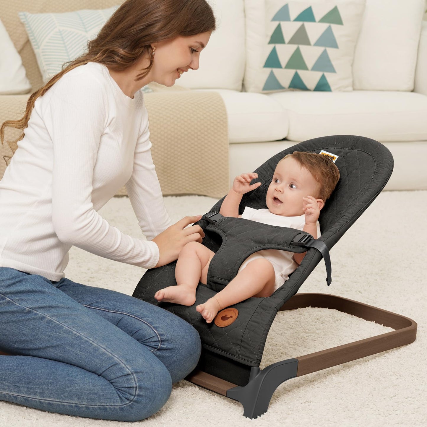 Side profile of Angelbliss portable infant bouncer seat