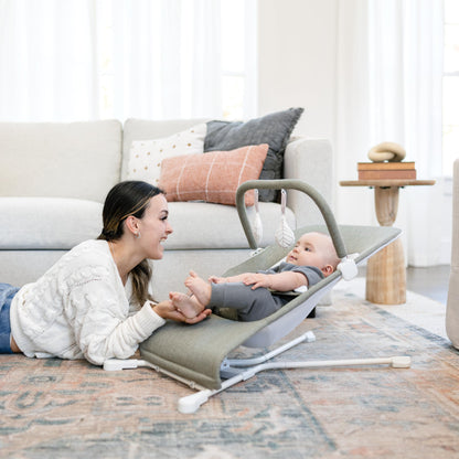 Folded Baby Delight Highland Portable Bouncer for storage