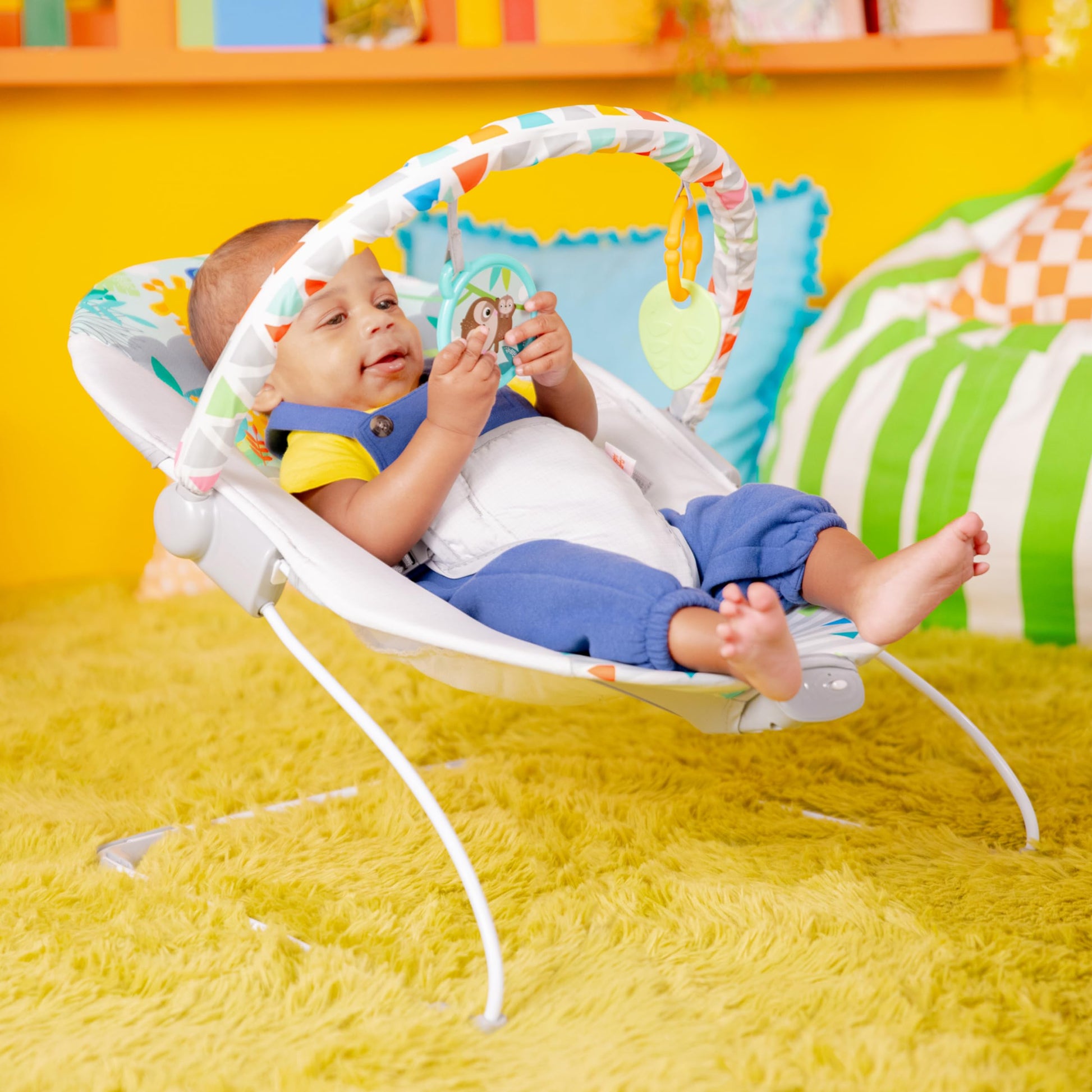 Close up of hanging toys on Bright Starts bouncer