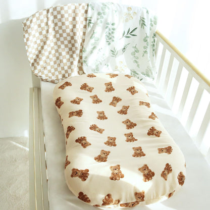 Infant lounger cover packaging and product branding
