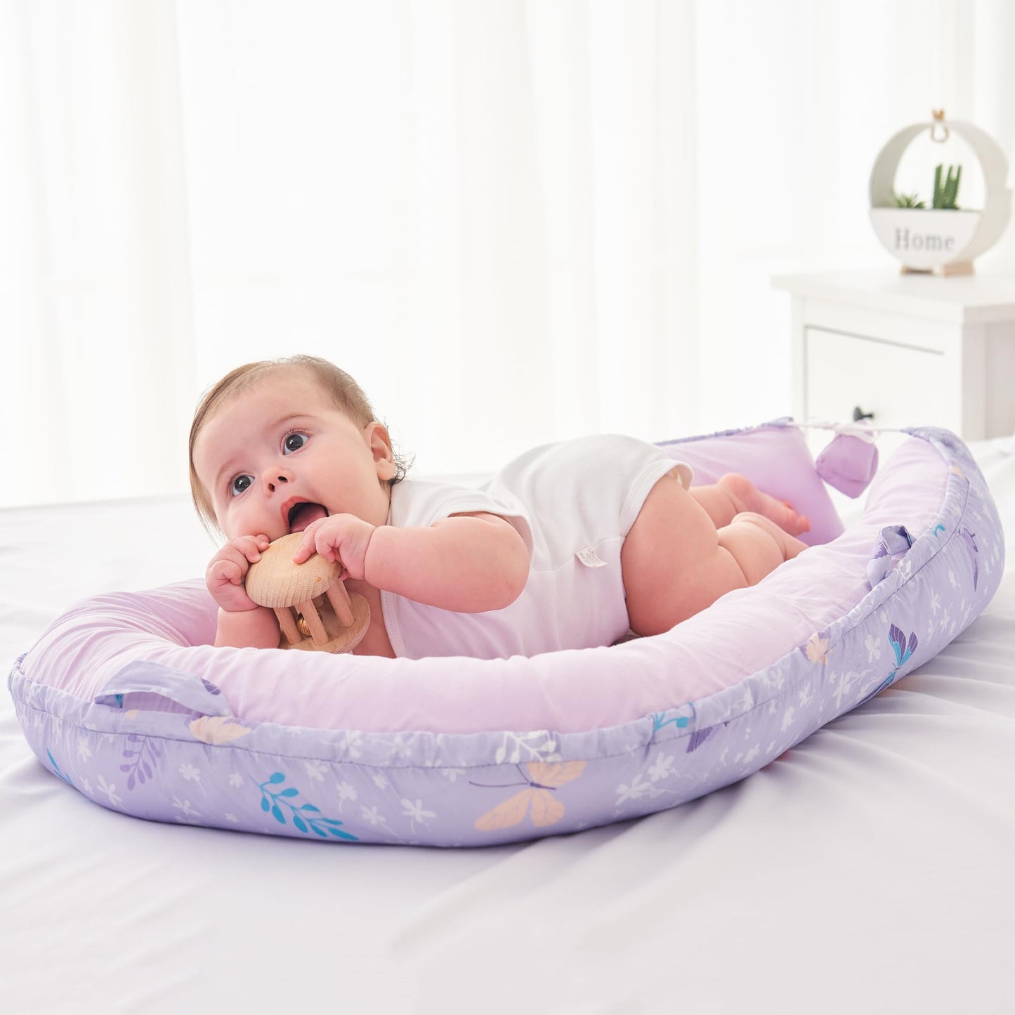 Infant relaxing in Viviland butterfly lounger