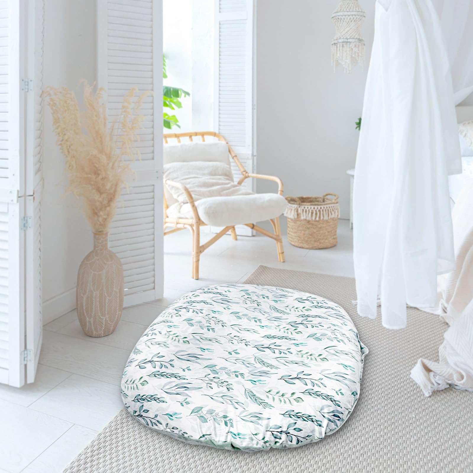 Top view of green leaf patterned infant lounger slipcover