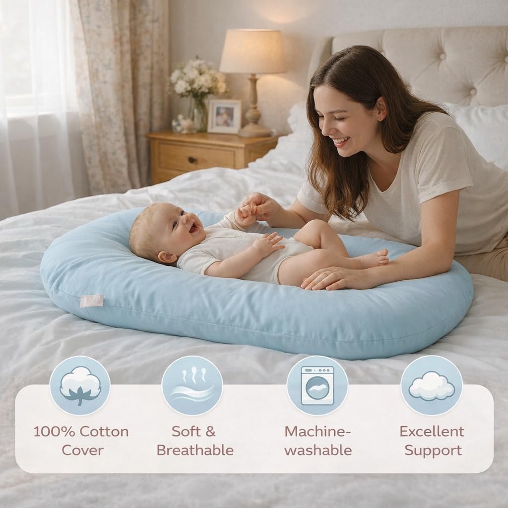 Loevin infant lounger showing raised bumper support