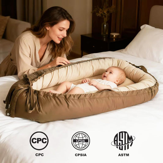 Side angle of Love Mage infant nest showing adjustable padding