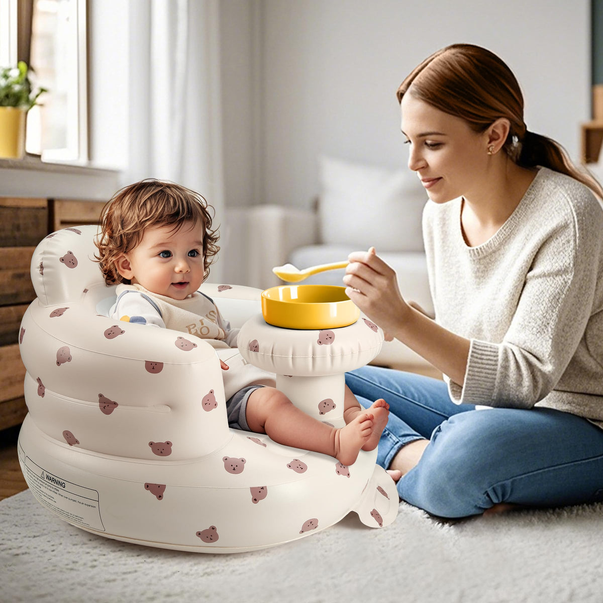 Jikasho Ekepe portable baby floor chair showing built-in air pump mechanism