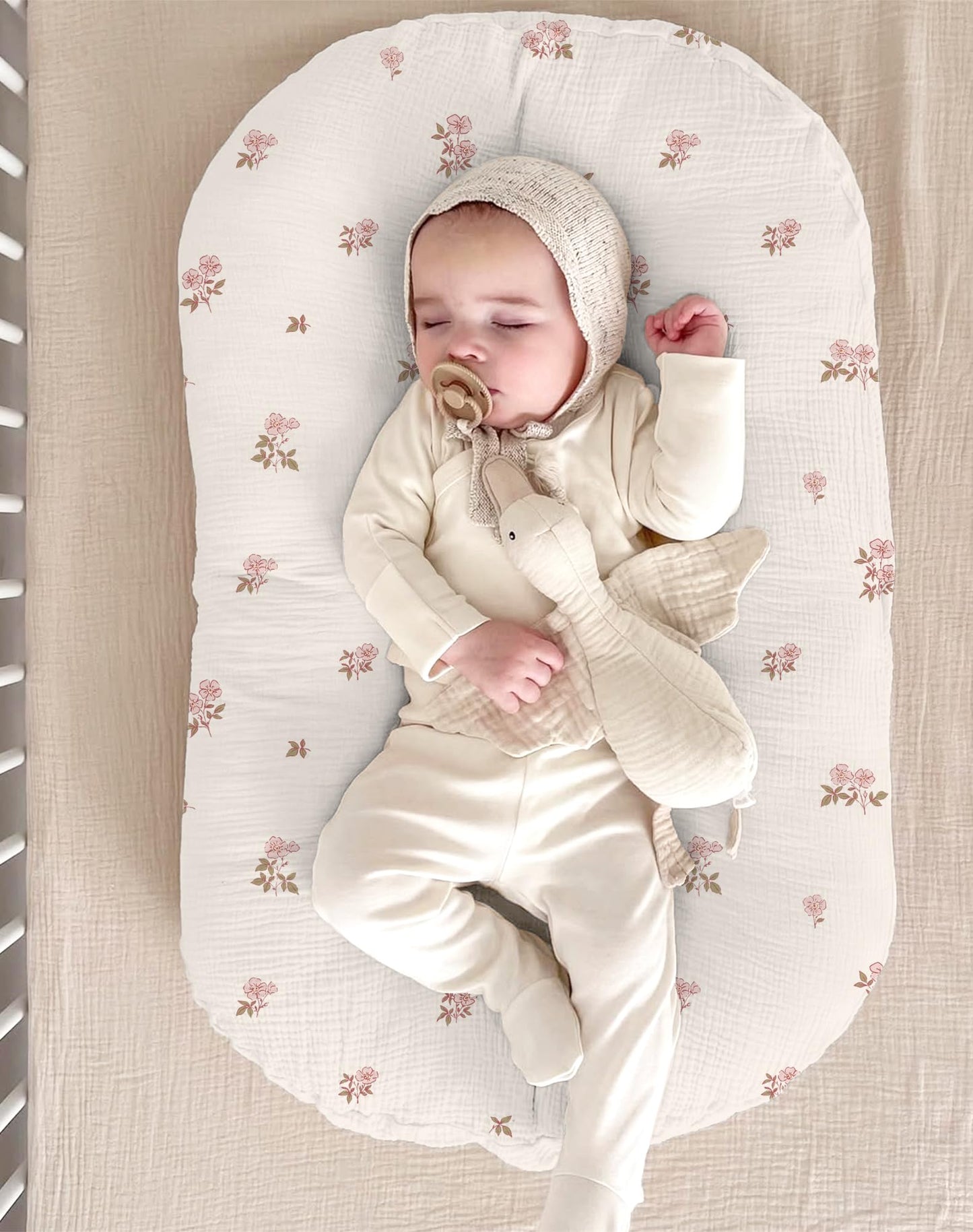 Baby resting on soft muslin lounger slipcover