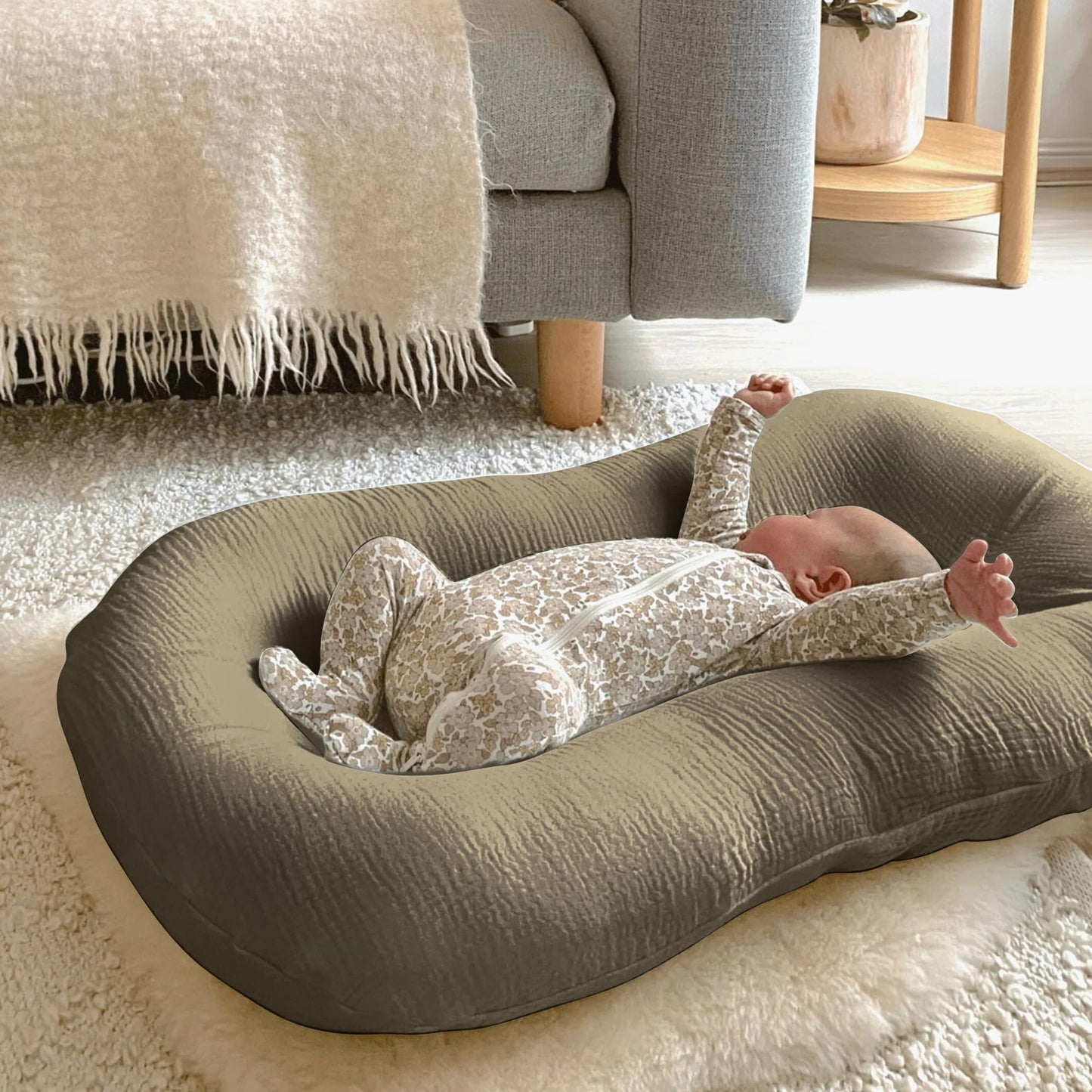 Soft muslin cotton texture close up of baby lounger cover