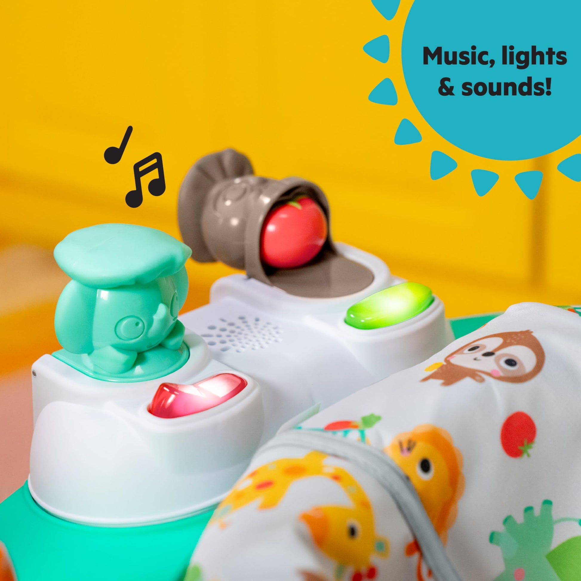 Close up of Bright Starts activity center food toy stations