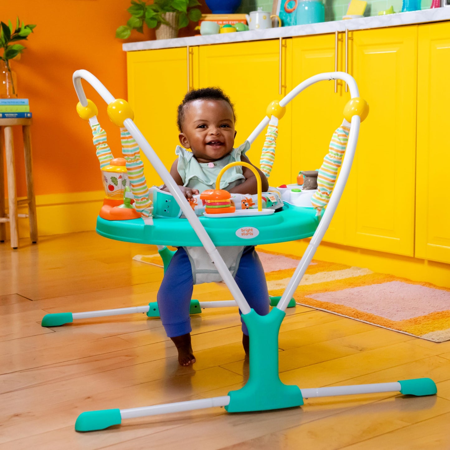 Bright Starts Cooking Up Fun jumper in a modern home