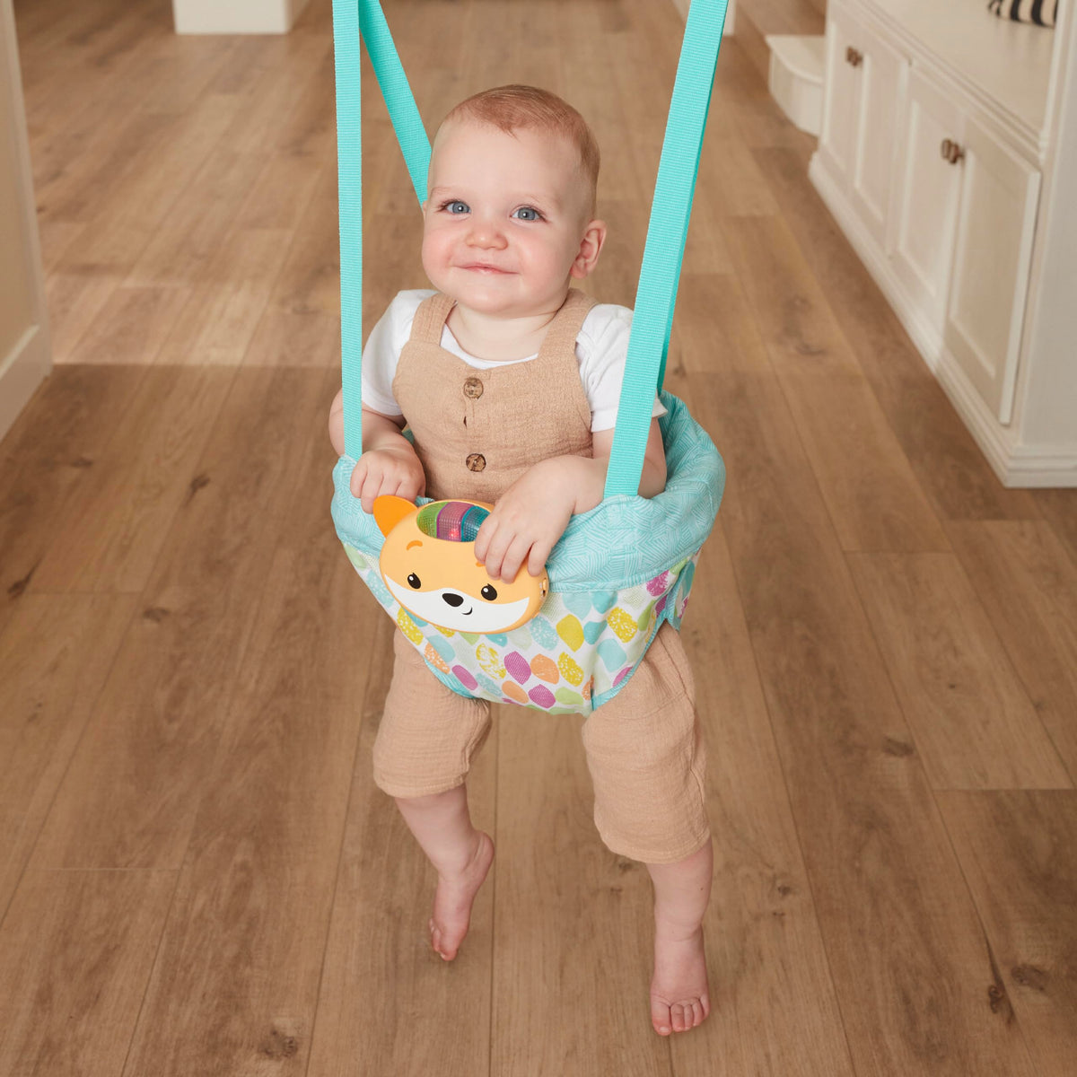 Soft machine-washable seat pad of the Infantino baby activity center