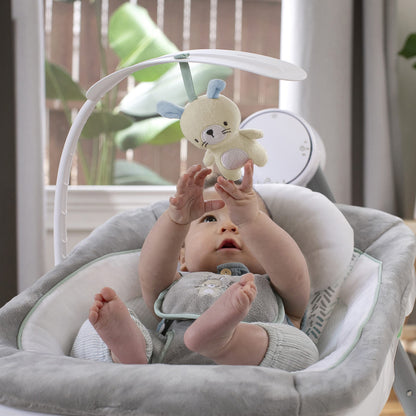 Ingenuity Anyway Sway baby swing in a living room setting