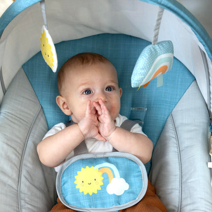 Ingenuity portable baby swing with two plush toys attached