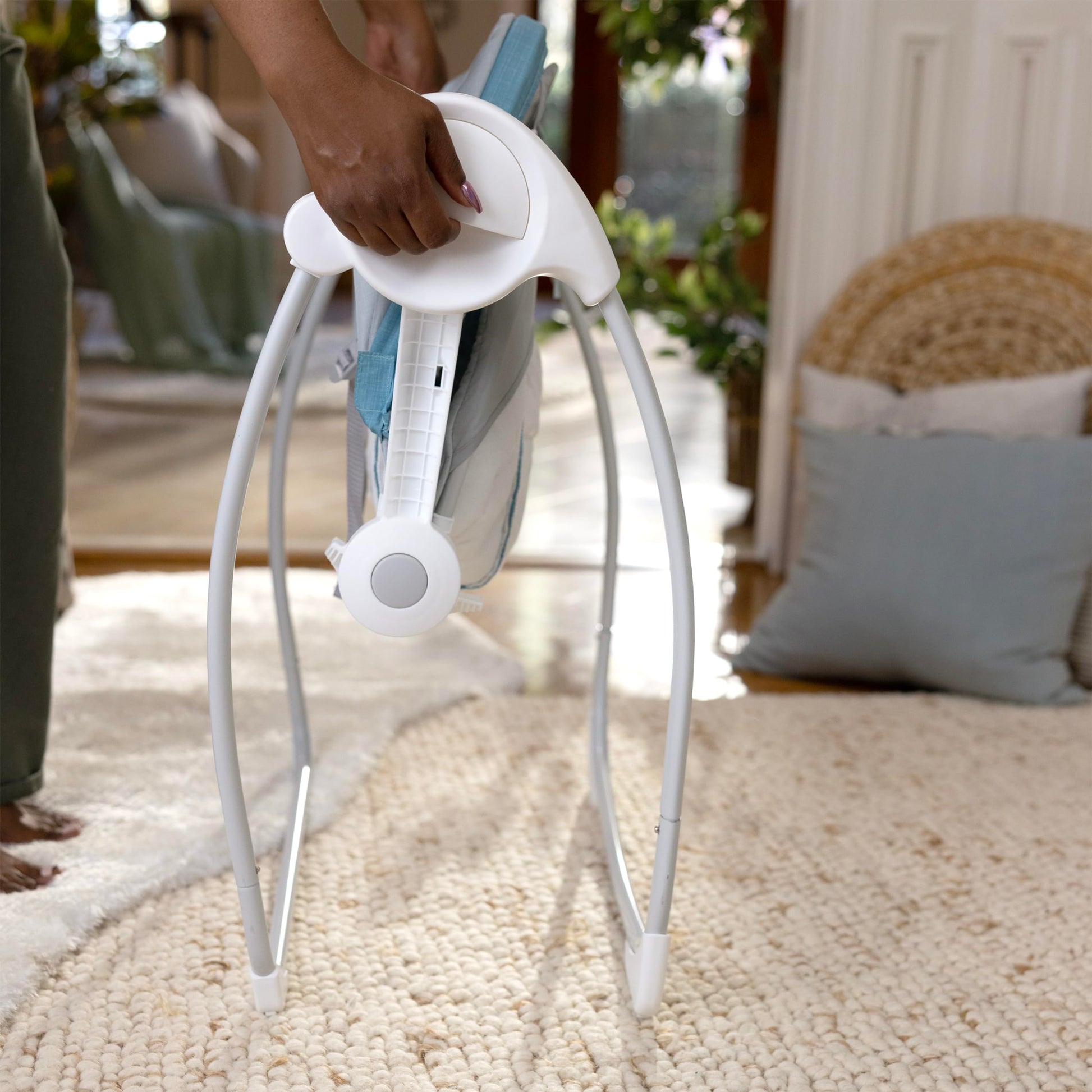 Detachable machine-washable seat pad of the Ingenuity swing