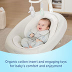Close-up of the organic cotton infant body support insert inside the swing