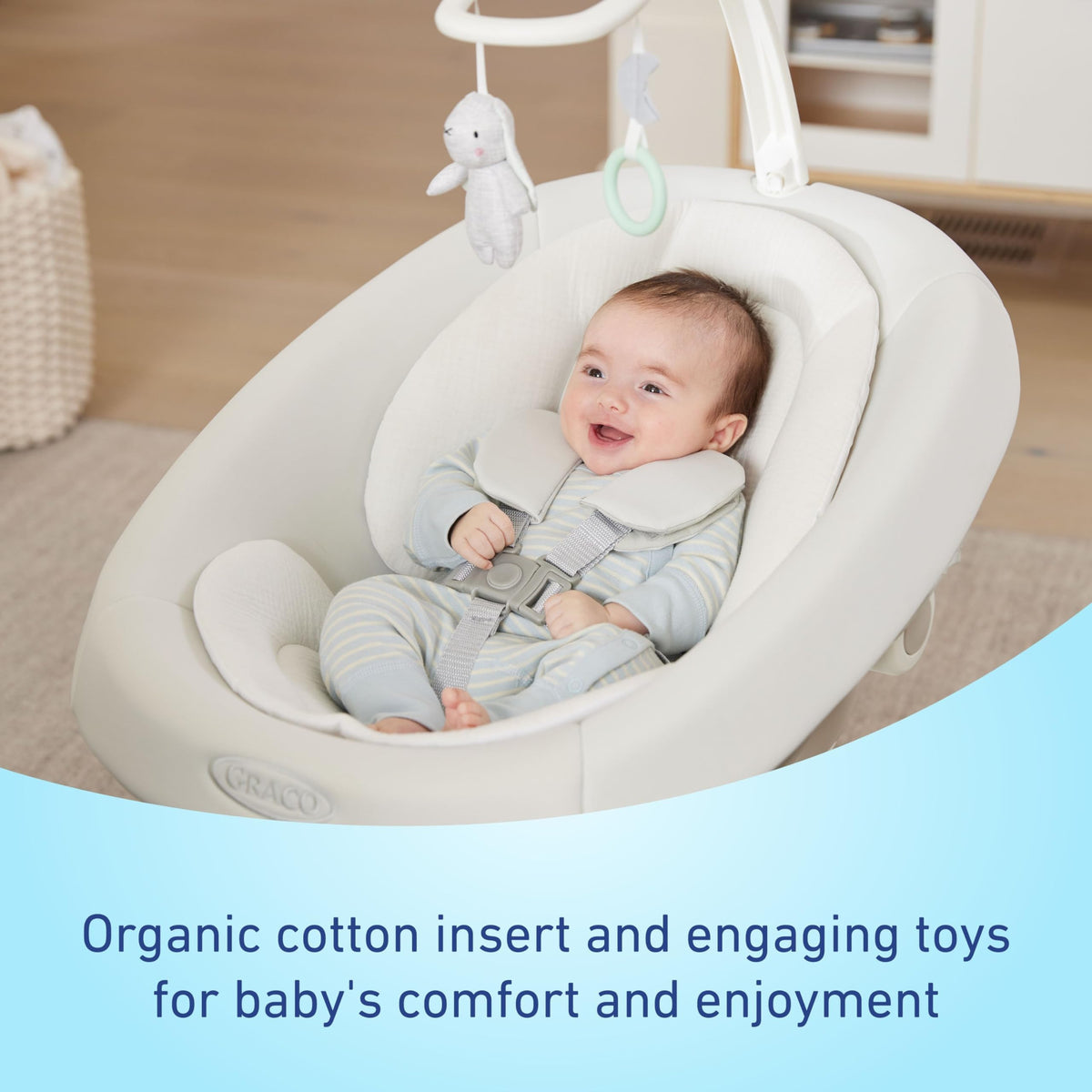 Close-up of the organic cotton infant body support insert inside the swing