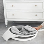 Reversible machine-washable seat pad and cushioned head support detail