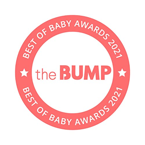 Angle view of the Munchkin electric baby swing set up in a modern room