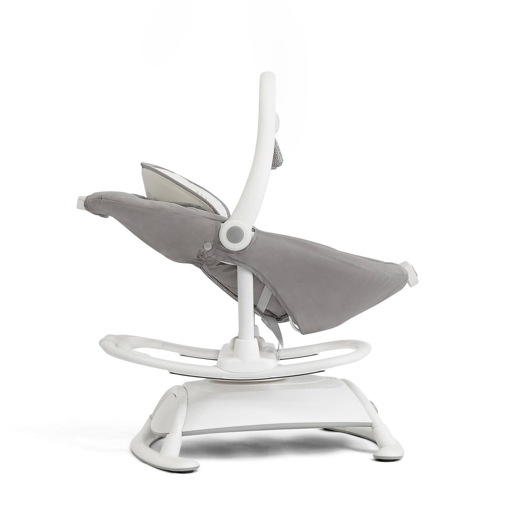 Overhead toy bar with two attached plush toys on Joie glider