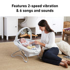 Graco Soothe 'N Sway LX showing the adjustable toy bar with soft plush toys.