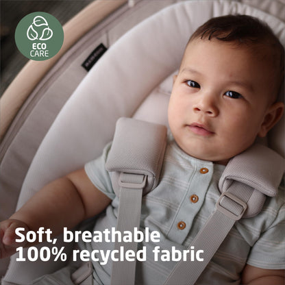 Maxi-Cosi infant swing showing three hundred sixty degree seat rotation mechanism.