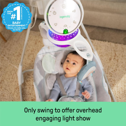 Close up of the light-up mobile and plush toys on the Ingenuity baby swing.
