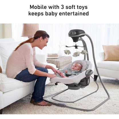 Top view of Graco DuetConnect LX showing overhead toy mobile and head support