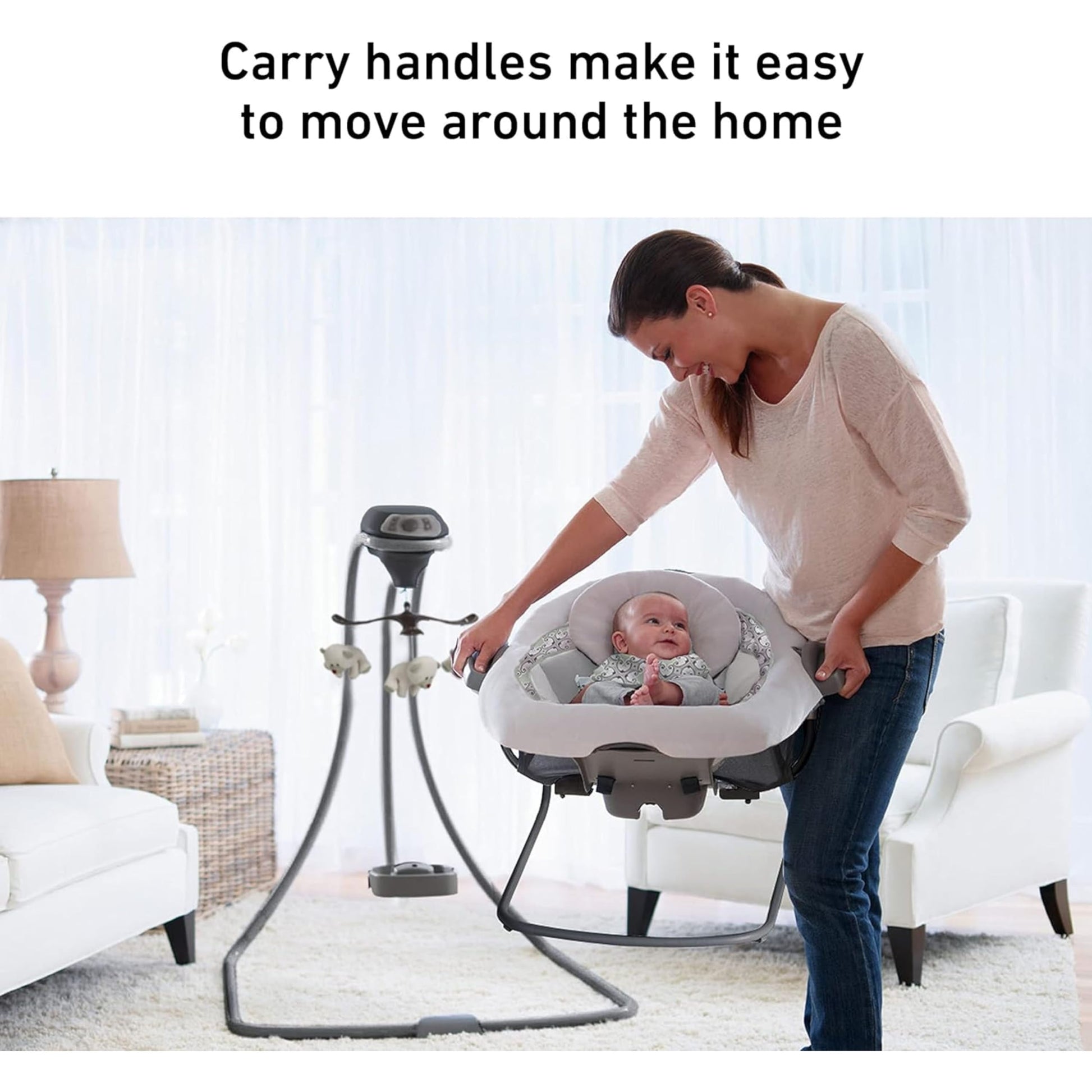 Graco DuetConnect LX baby swing set up in a modern living room