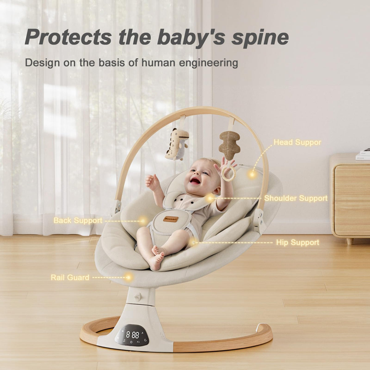 Monamii baby cradle displaying natural wood toy bar and plush cushioning