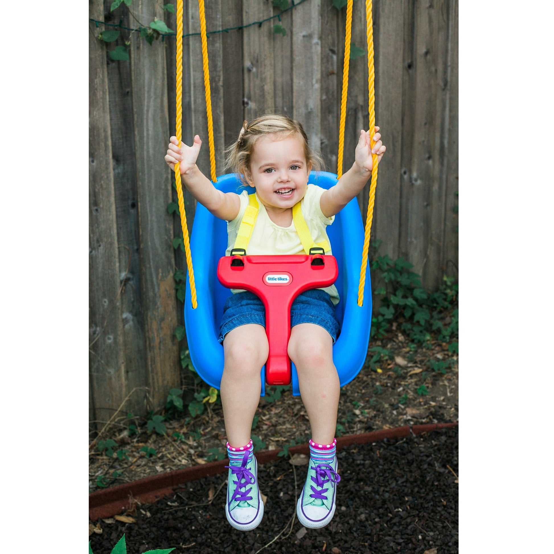 Close up of Little Tikes swing T-bar and safety straps
