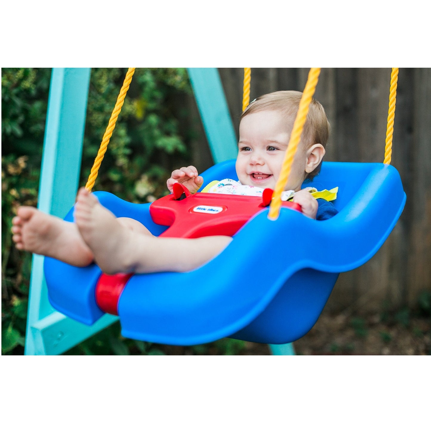 Little Tikes baby swing showing adjustable yellow ropes