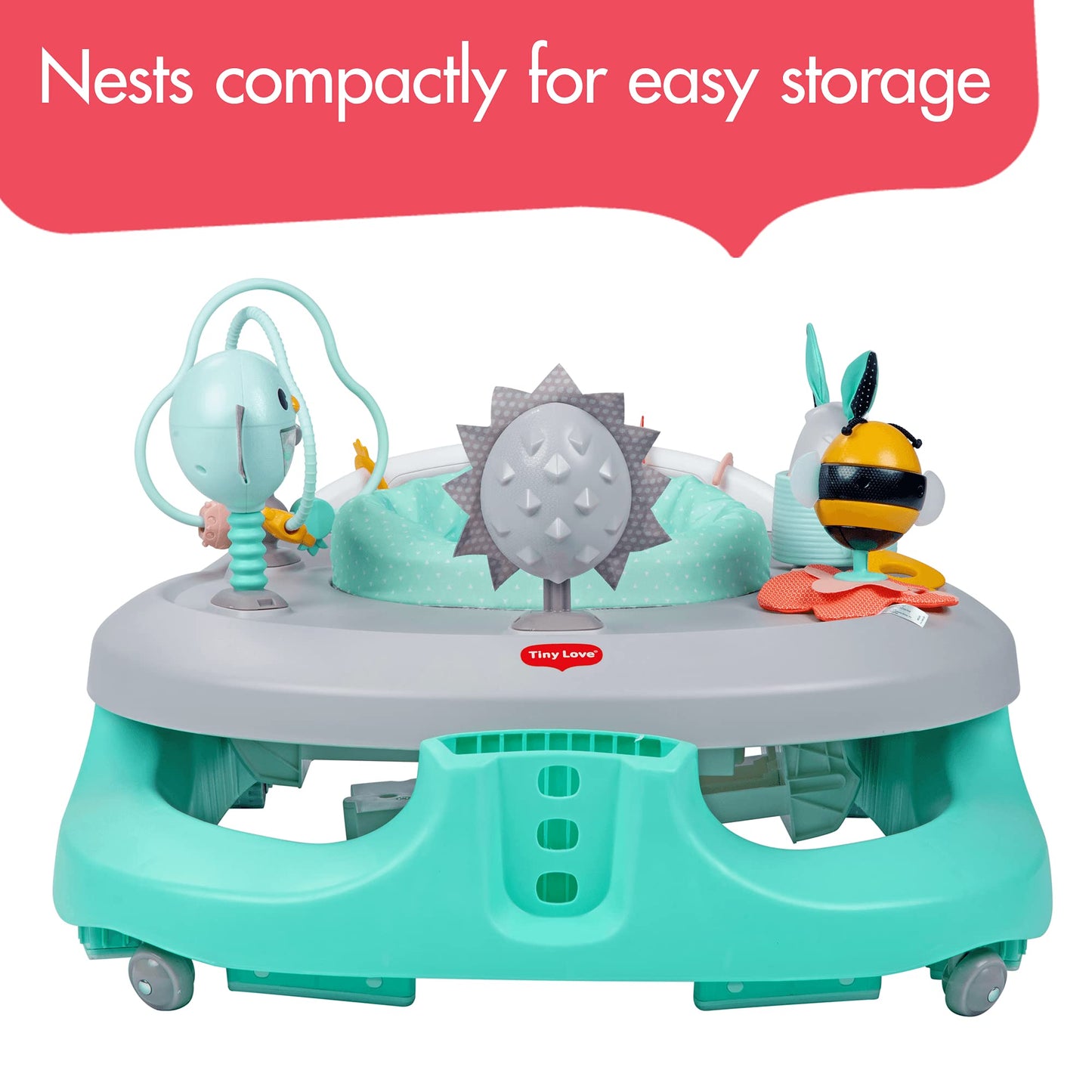 Baby playing in Tiny Love 4-in-1 Here I Grow activity center
