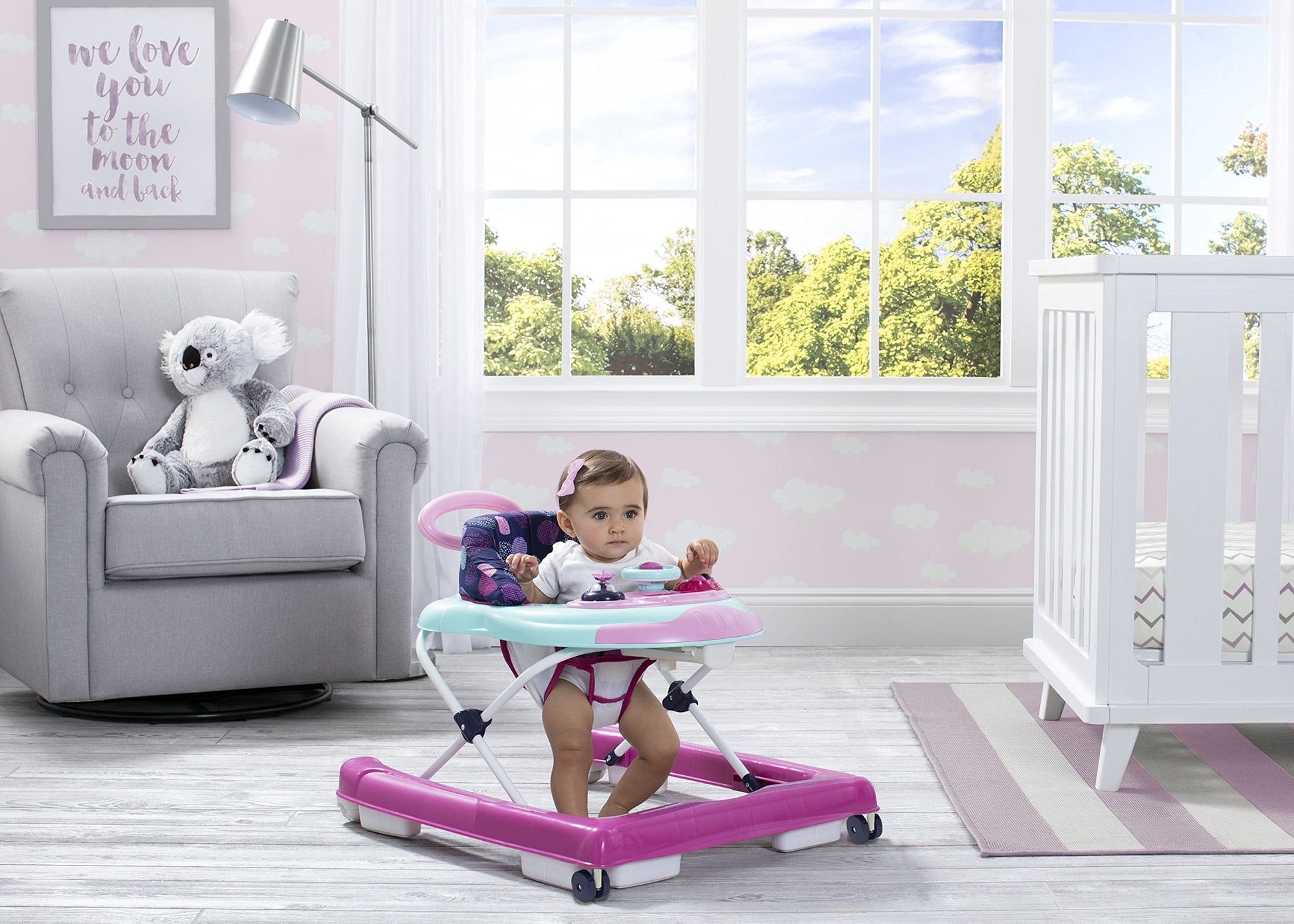 Side profile of Delta Children activity walker in Orbit color