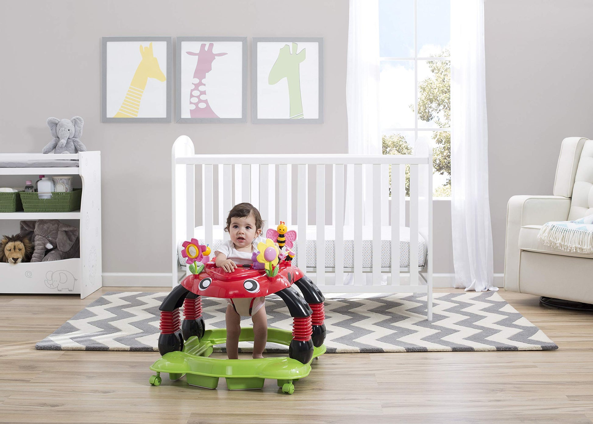 Close up of interactive toys on Delta Children walker tray