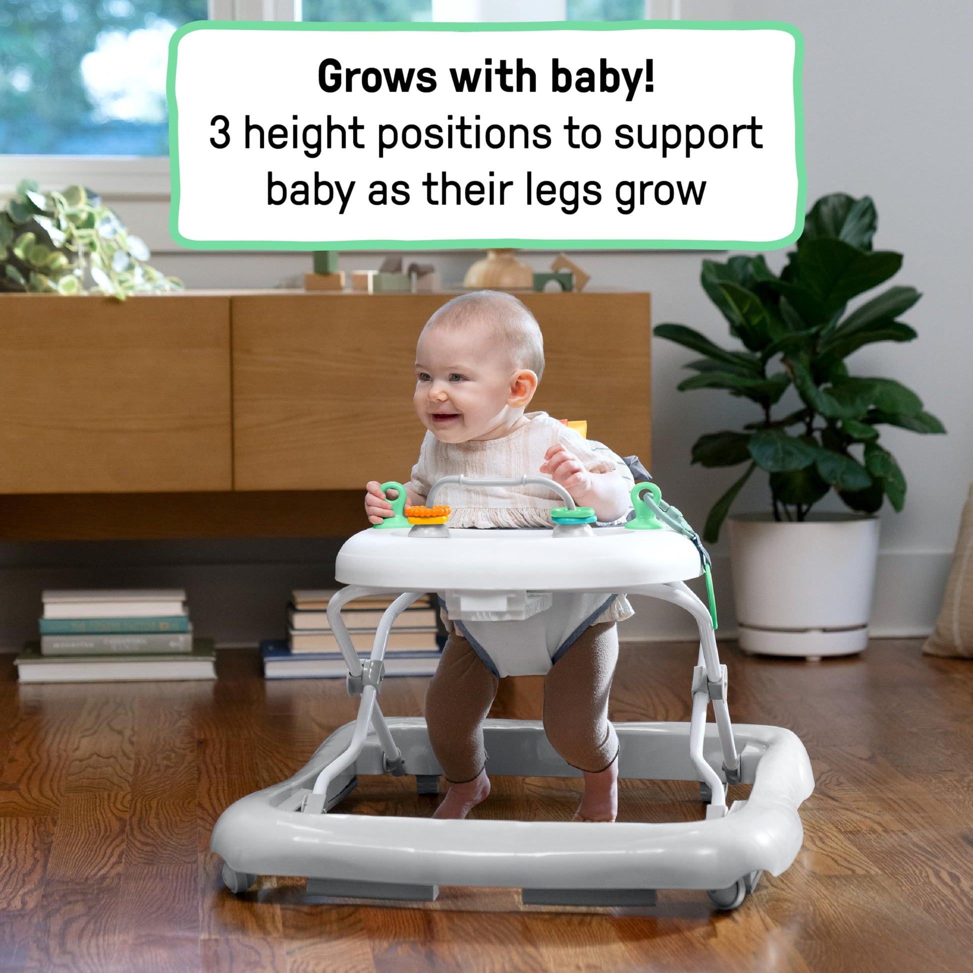 Side profile of Ingenuity activity walker with toys