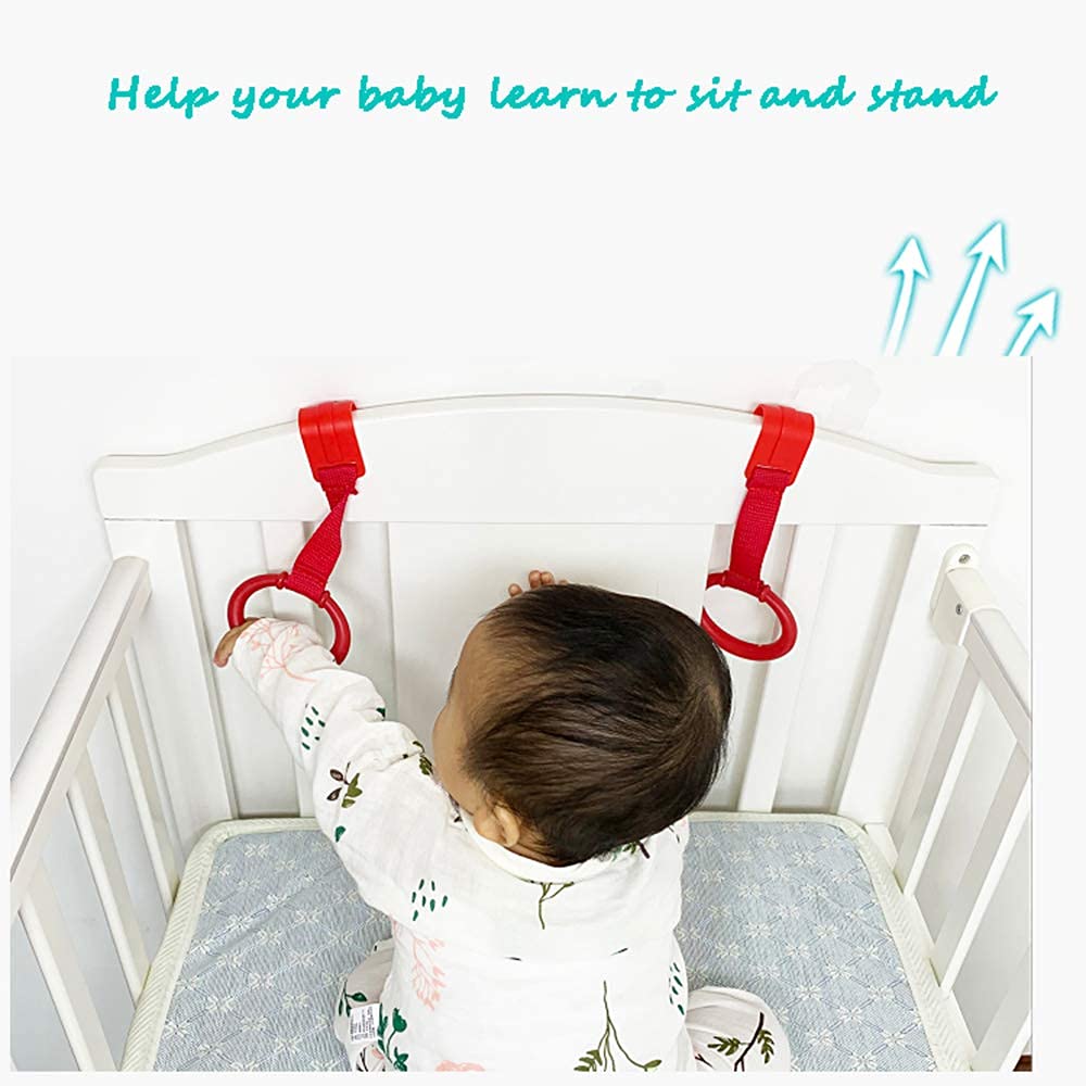 Baby playpen pull up rings attached to crib rail