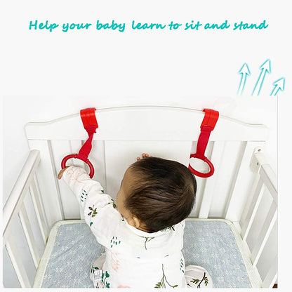 Baby playpen pull up rings attached to crib rail