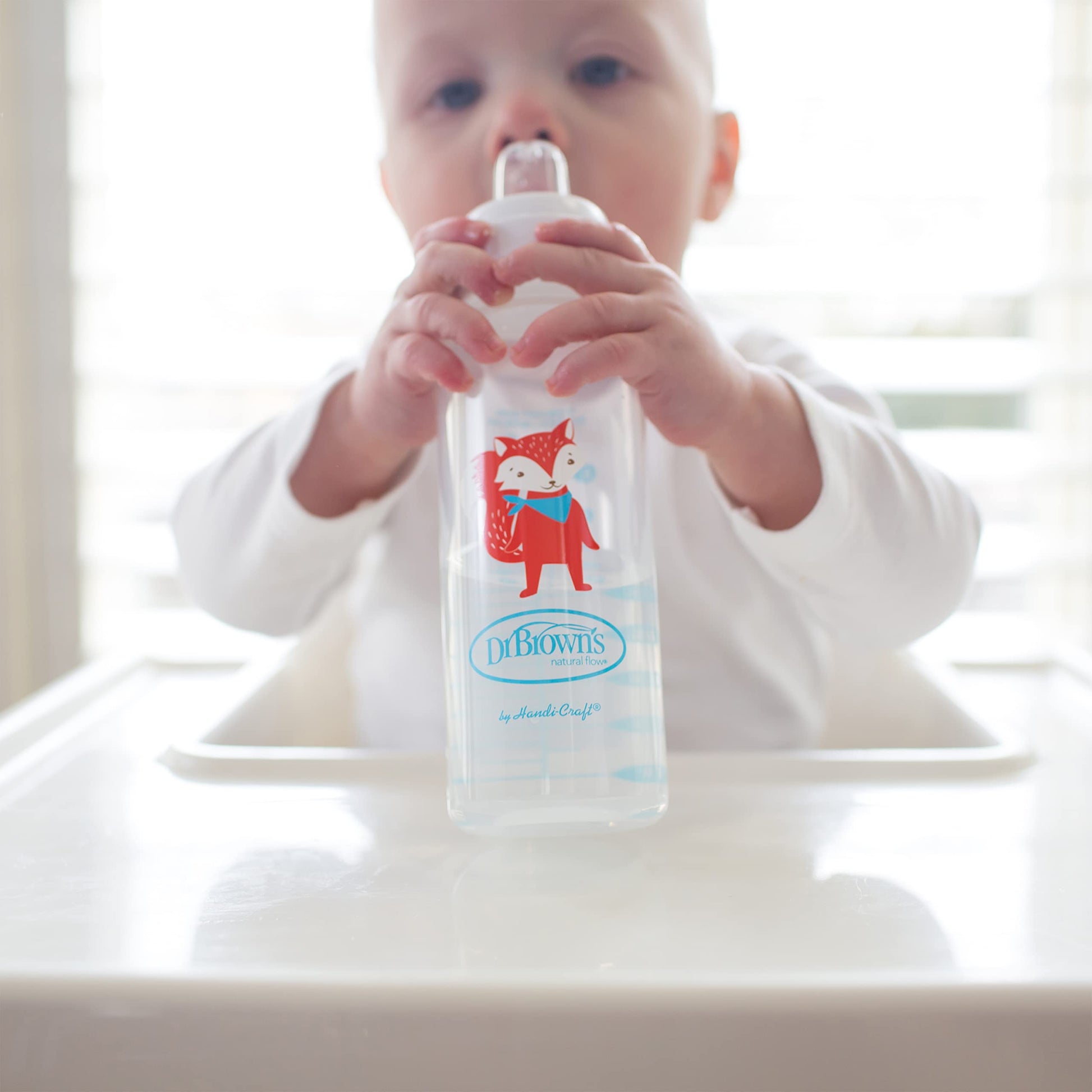 Detailed view of baby sippy bottle components